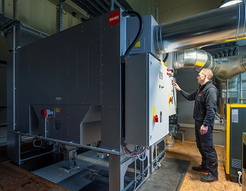 Reinluftanlage für Holzwerkstätte richtig dimensionieren: Luftmenge & Filterfläche erklärt